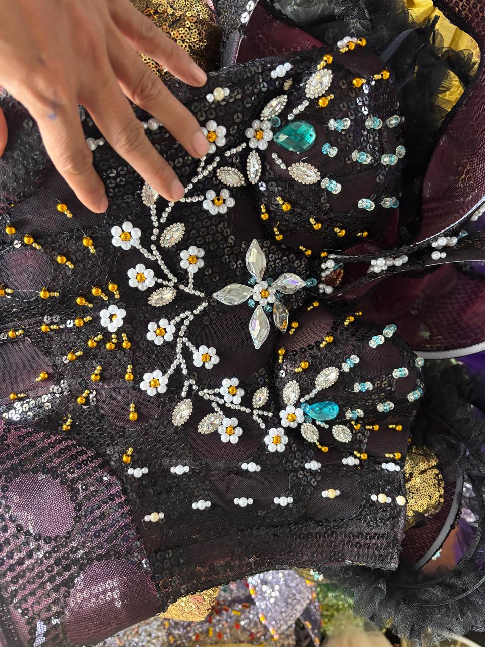 Hand beading and finishing at Canan Vietnam Dress Factory